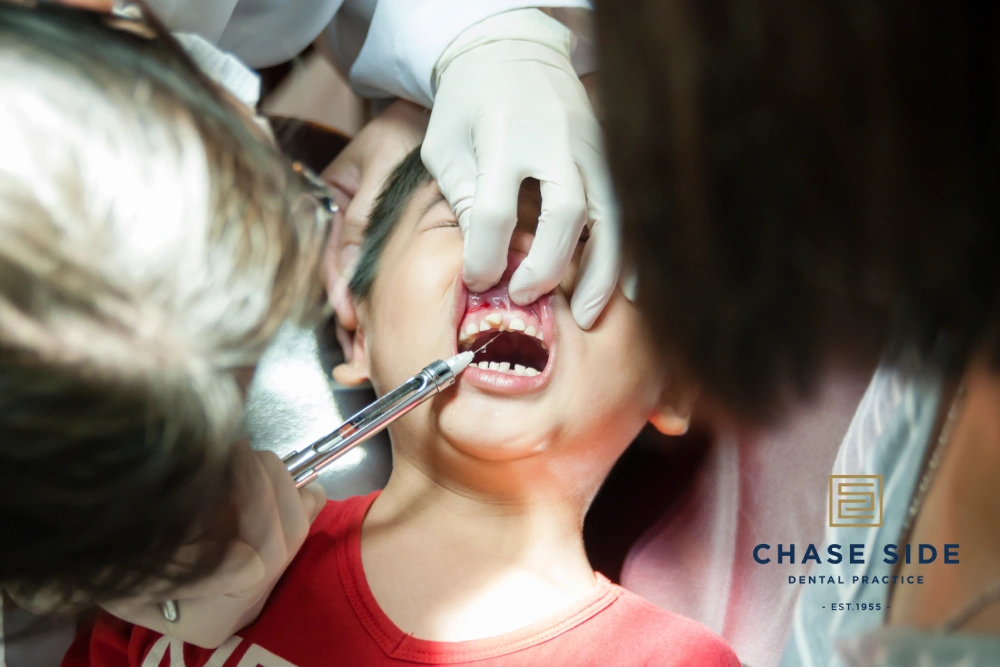 When should children have their first dental checkup?